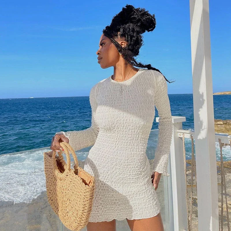 BerryBetty - Beach Vacation Smocked Crew Neck Long Sleeve Tie Back Mini Dress - White Trendy Floral Mini Dress BerryBetty - Beach Vacation Smocked Crew Neck Long Sleeve Tie Back Mini Dress - White Trendy Floral Mini Dress